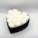 Open white heart-shaped preserved rose box showing sixteen preserved roses by ZESO Blooms