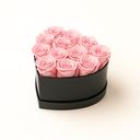 12 pink preserved roses arranged in matte heart box by ZESO Blooms – romantic floral gift symbolizing love and gratitude
