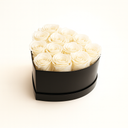 12 white preserved roses arranged in matte heart box by ZESO Blooms – elegant floral gift symbolizing purity and peace
