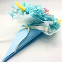 Close-up of blue preserved rose in ice cream cone flower bouquet made with real preserved flowers by ZESO Blooms™
