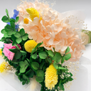 Handcrafted seed flower detail made from sunflower seed shells in a candy box preserved flower bouquet by ZESO Blooms™