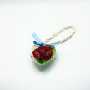 Forever rose heart keychain with real preserved rose displayed in a clear heart-shaped plastic box and faux pearl chain by ZESO Blooms™