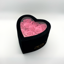 Pink heart-shaped preserved rose box with twelve preserved roses and lid closed, romantic floral gift by ZESO Blooms