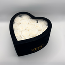White heart-shaped preserved rose box with sixteen preserved roses and lid closed by ZESO Blooms