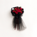 Midnight Black fairy mesh used in floral bouquet wrapping — elegant sheer layering for preserved or fresh flowers.
