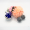 Cute plush charm preserved rose keychain with a real rose sealed in a round plastic case by ZESO Blooms™
