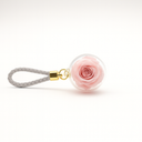 Round Bloom Keychain by ZESO Blooms — preserved rose charm in crystal acrylic globe with gold hardware.

