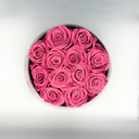 Top view of pink round preserved rose box with twelve preserved roses from ZESO Blooms