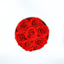 Top view of red round preserved rose box featuring seven long-lasting preserved roses by ZESO Blooms