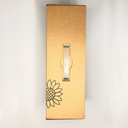 Gold wall sconce with sunflower design on a white background