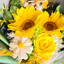 Bouquet of yellow and white flowers with green leaves